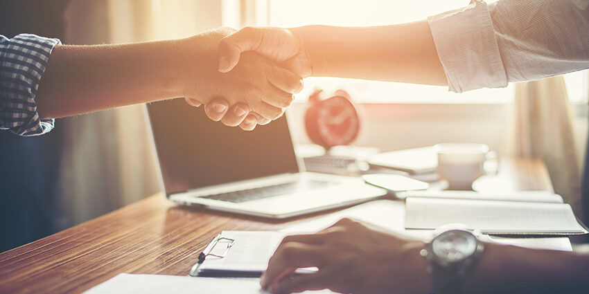 Business People Handshake Greeting Deal at work.